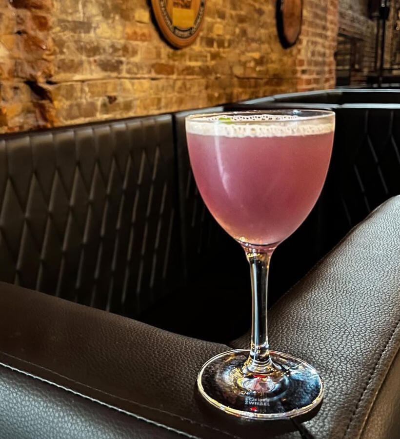 Empress 1908 gin, Absinthe, honey, lemon juice, ginger bitters, mint garnish