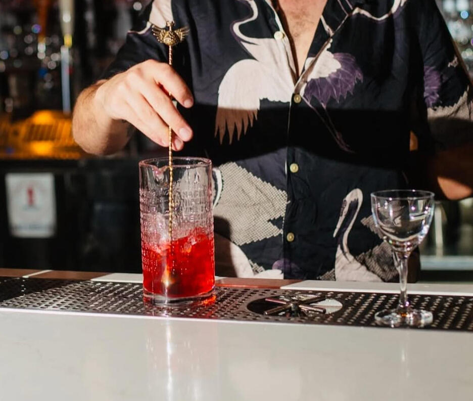 Chemist Navy Strength gin, Calavados brandy, Cappelletti, Campari, Krupinkas, cranberry bitters, cranberry skewer